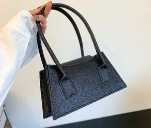 VERSATILE HANDBAG