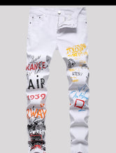 Load image into Gallery viewer, GRAFFITI PRINT SKINNY JEANS
