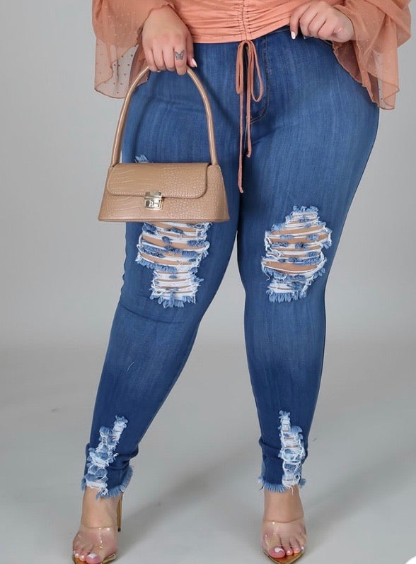 PLUS SIZE RIPPED FRINGE HEM JEANS